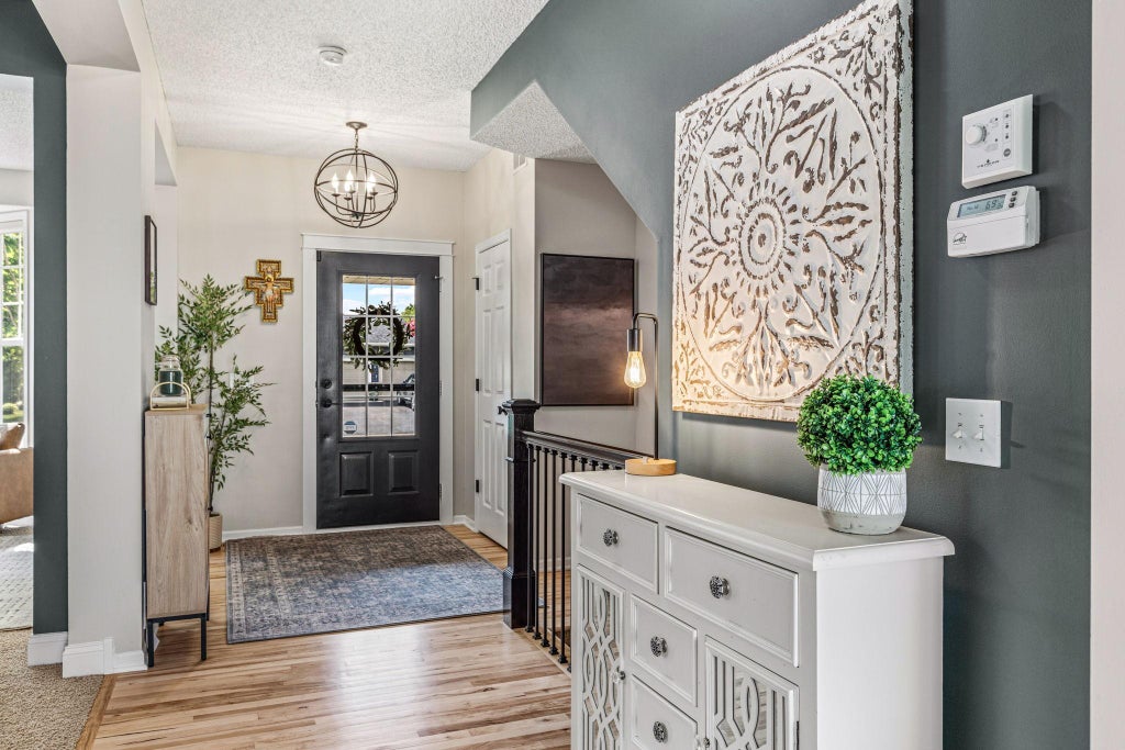 Photo of 9908 Toledo Drive N, Brooklyn Park, MN 55443 (MLS # 7095458)
