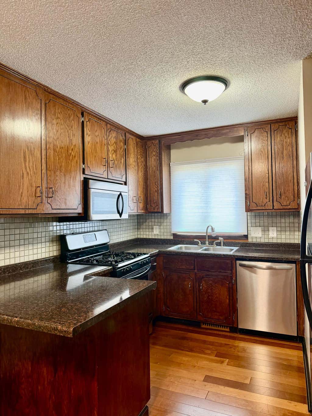 Photo of 1552 Creek Meadows Drive NW, Coon Rapids, MN 55433 (MLS # 7118475)