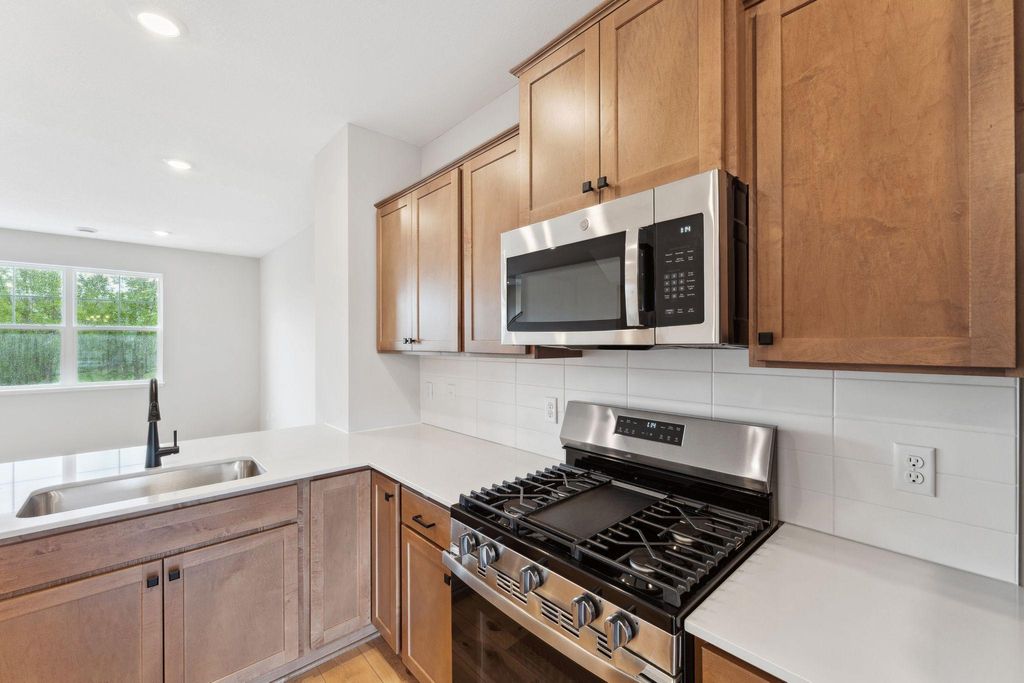 Photo of 14606 Rhinestone Street NW, Ramsey, MN 55303 (MLS # 6824146)