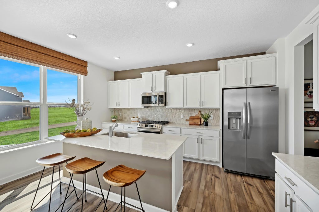 Photo of 10039 185th Avenue NW, Elk River, MN 55330 (MLS # 7148606)