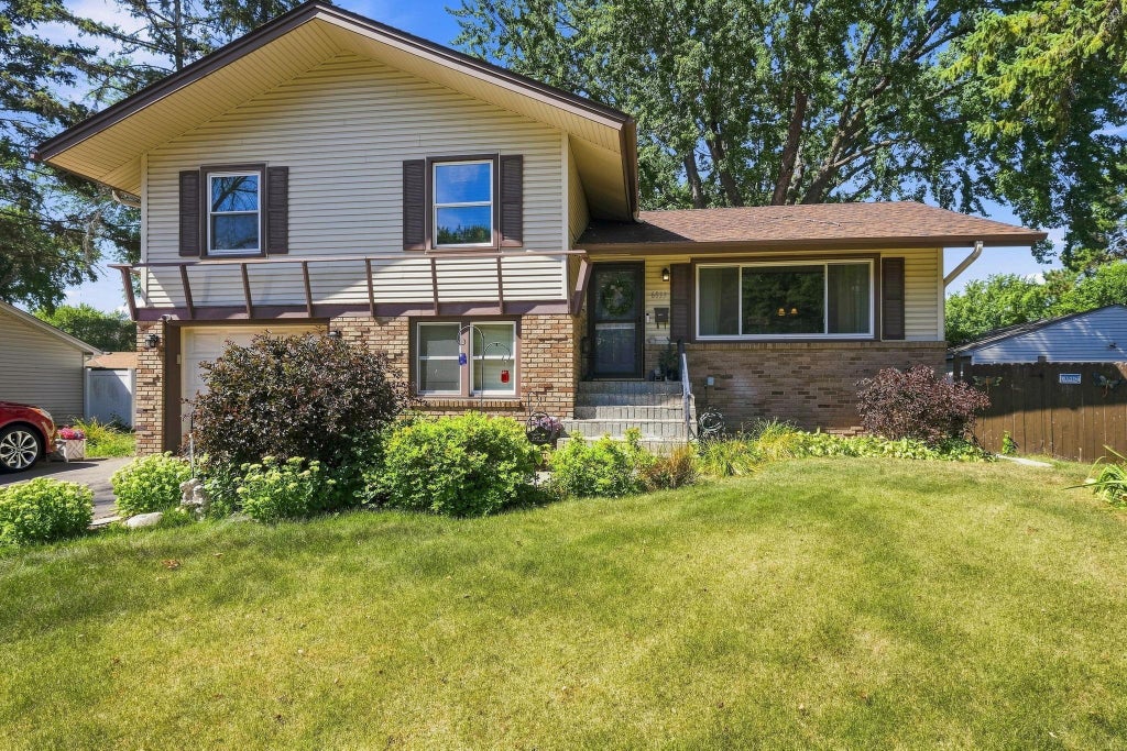Photo of 6933 Brunswick Avenue N, Brooklyn Park, MN 55429 (MLS # 7134364)