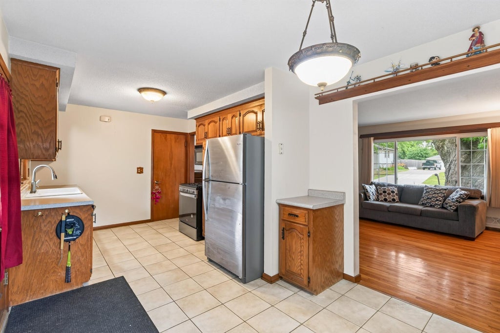 Photo of 69 Dennis Lane N, Maplewood, MN 55119 (MLS # 7115946)