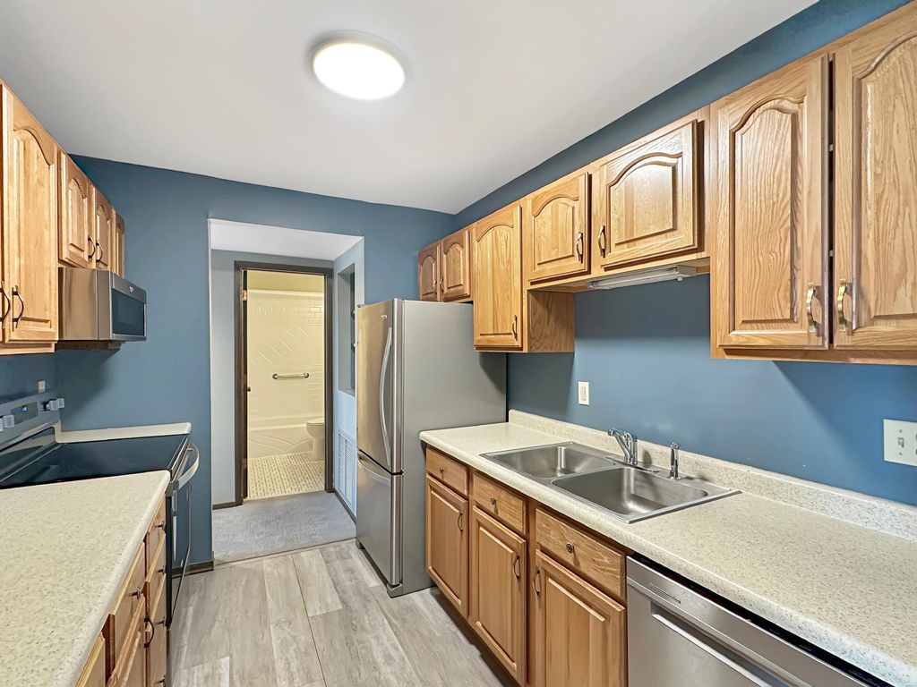 Photo of 122 Demont Avenue E #358, Little Canada, MN 55117 (MLS # 6815728)