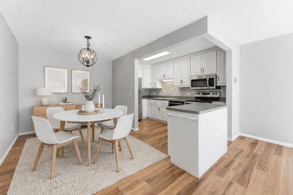 Photo of 10311 Cedar Lake Road #103, Minnetonka, MN 55305 (MLS # 7008324)