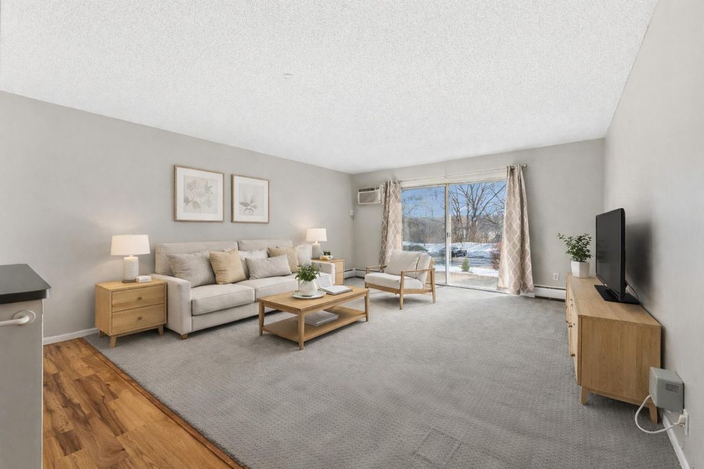 Photo of 10311 Cedar Lake Road #103, Minnetonka, MN 55305 (MLS # 7008324)