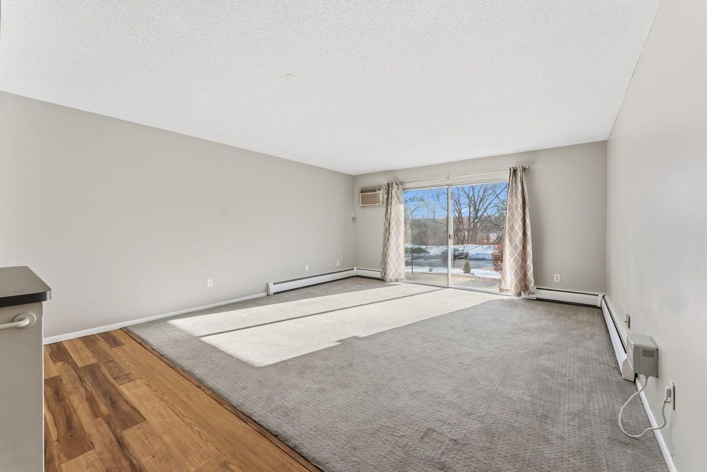 Photo of 10311 Cedar Lake Road #103, Minnetonka, MN 55305 (MLS # 7008324)