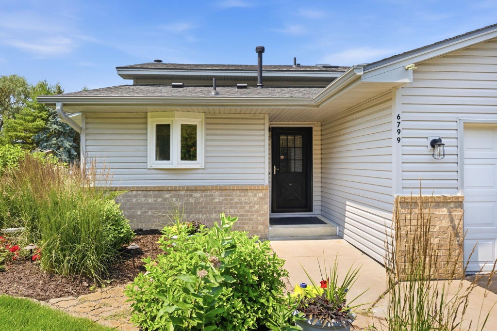 Photo of 6799 Sunnyslope Drive N, Maple Grove, MN 55311 (MLS # 7102195)