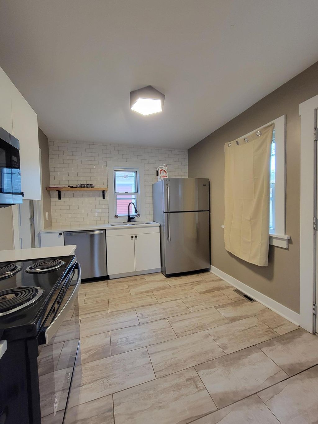 Photo of 1312 3rd Street NE, Rochester, MN 55906 (MLS # 7048947)