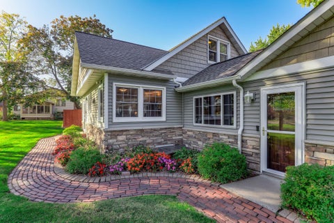 Photo of 7697 Stillwater Way N, Oakdale, MN 55128 (MLS # 7160075)