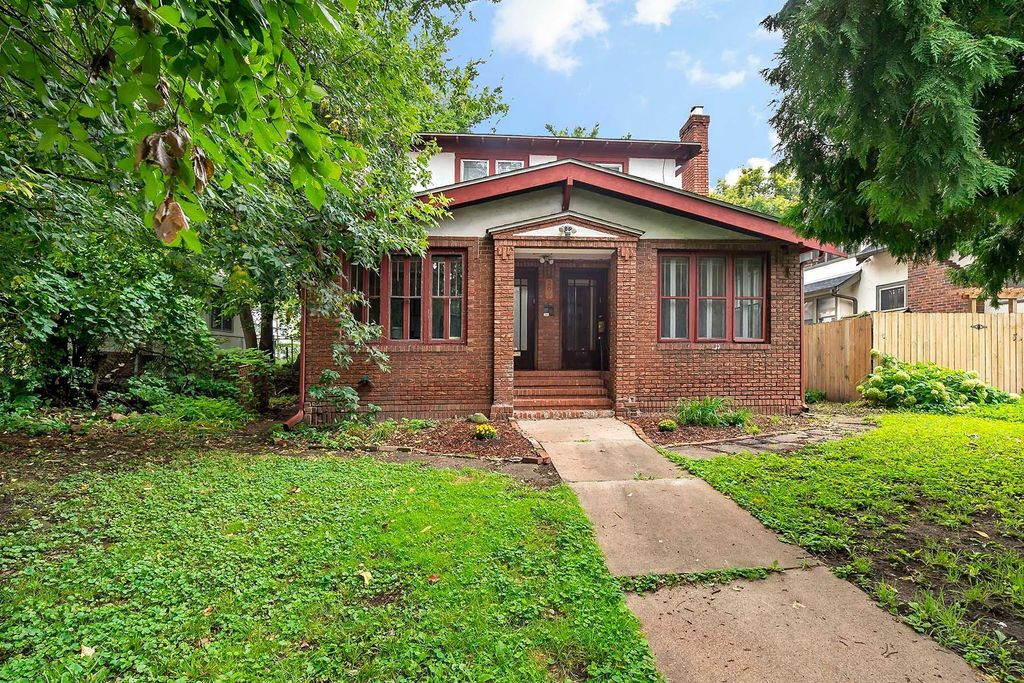 Photo of 209 Cedar Lake Road N, Minneapolis, MN 55405 (MLS # 7029492)