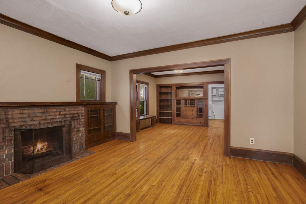 Photo of 209 Cedar Lake Road N, Minneapolis, MN 55405 (MLS # 7029492)