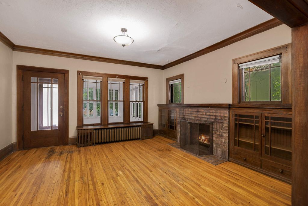 Photo of 209 Cedar Lake Road N, Minneapolis, MN 55405 (MLS # 7029492)