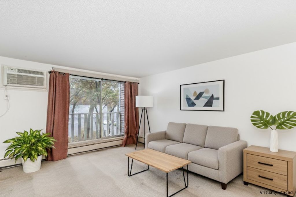 Photo of 1601 N Innsbruck Drive NE #123, Fridley, MN 55432 (MLS # 7054070)