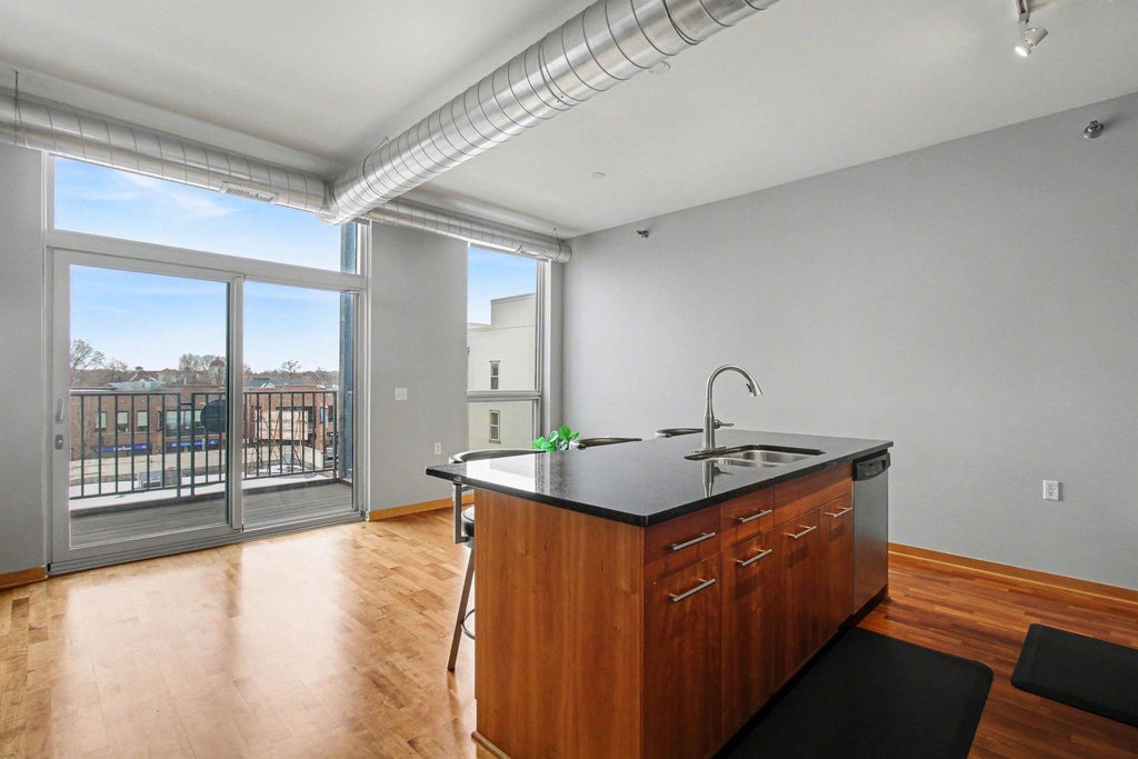 Photo of 1211 Lagoon Avenue #410, Minneapolis, MN 55408 (MLS # 7126987)