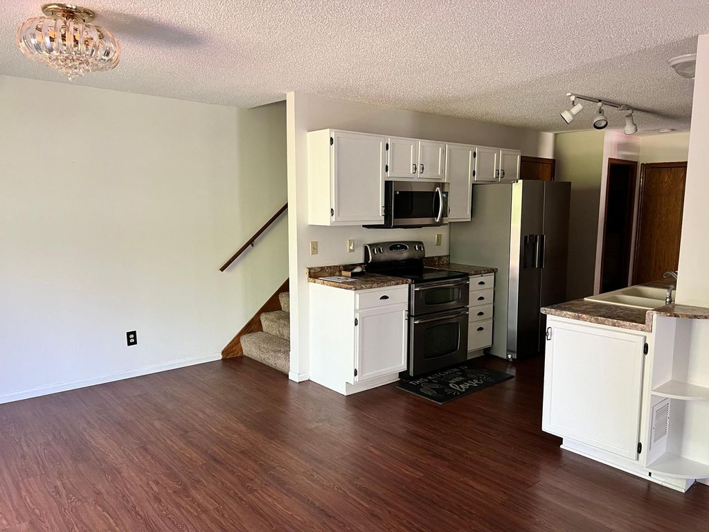 Photo of 1219 Pecks Woods Drive, New Brighton, MN 55112 (MLS # 7062355)