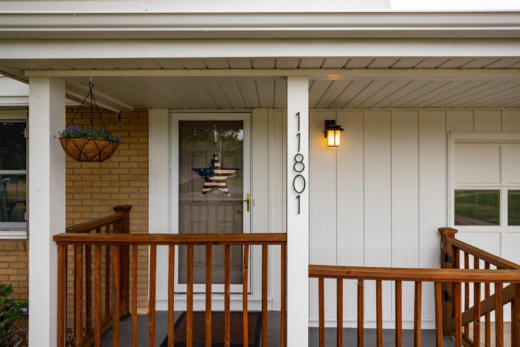 Photo of 11801 Crooked Lake Boulevard NW, Coon Rapids, MN 55433 (MLS # 7091485)
