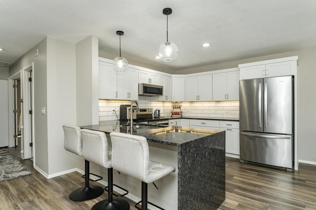 Photo of 2046 26th Avenue NW, Rochester, MN 55901 (MLS # 7012484)