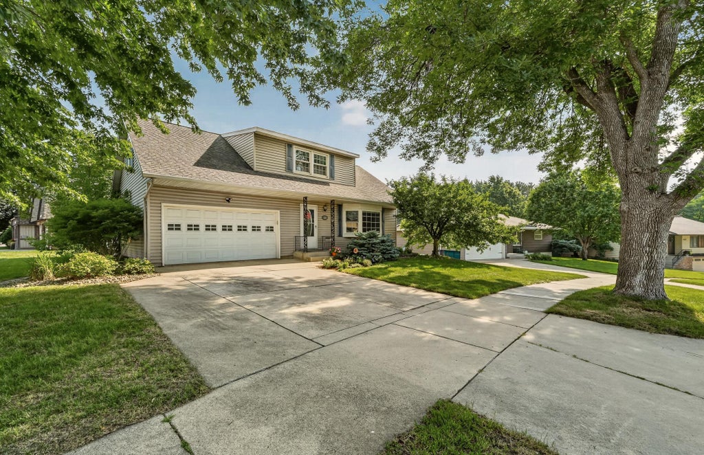 Photo of 1648 13th Avenue NW, Rochester, MN 55901 (MLS # 7109209)