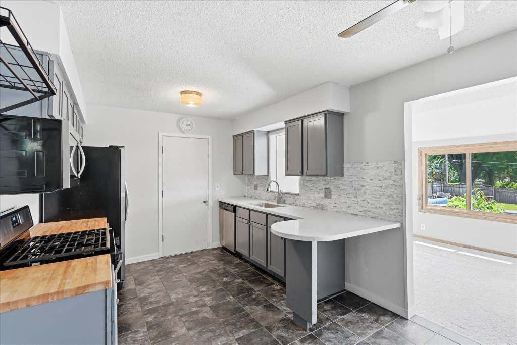 Photo of 8142 Homestead Avenue S, Cottage Grove, MN 55016 (MLS # 7082129)
