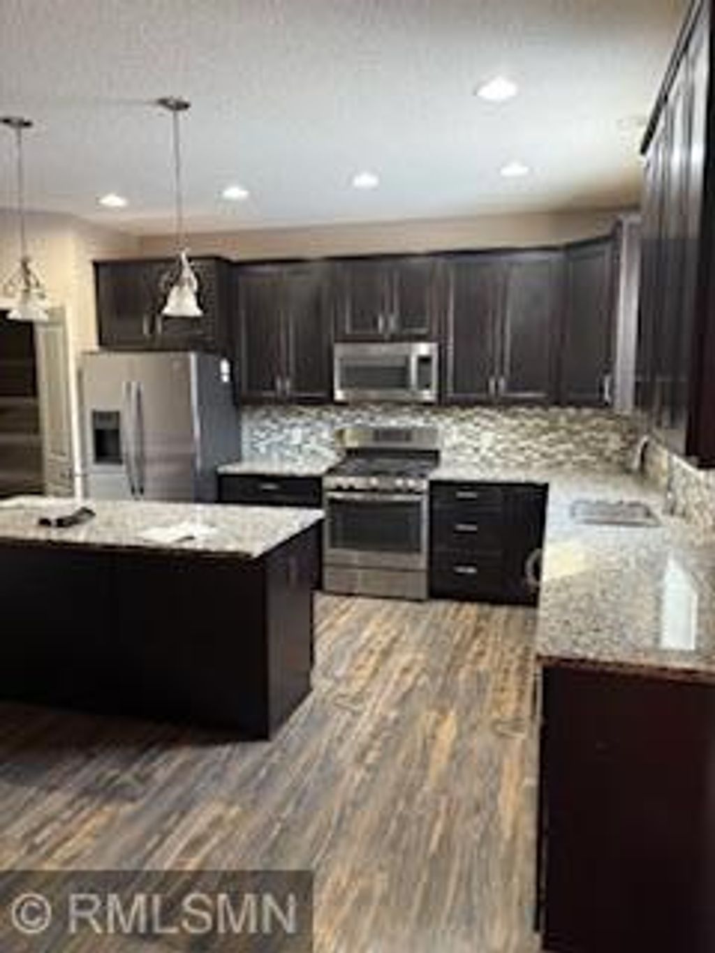 Photo of 12796 Legacy Creek Parkway NE, Blaine, MN 55449 (MLS # 7013004)