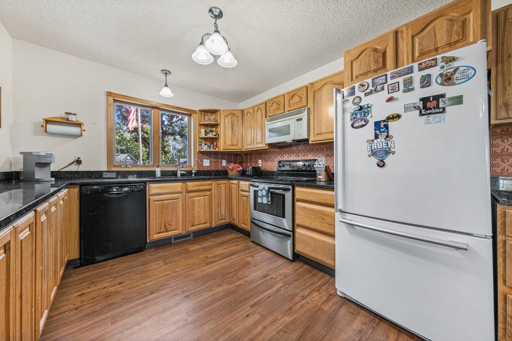 Photo of 8634 Lincoln Street NE, Blaine, MN 55434 (MLS # 7153643)