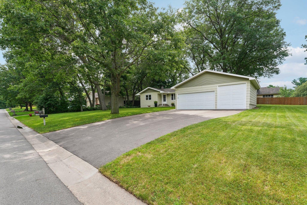 Photo of 2324 130th Avenue NW, Coon Rapids, MN 55448 (MLS # 7101898)
