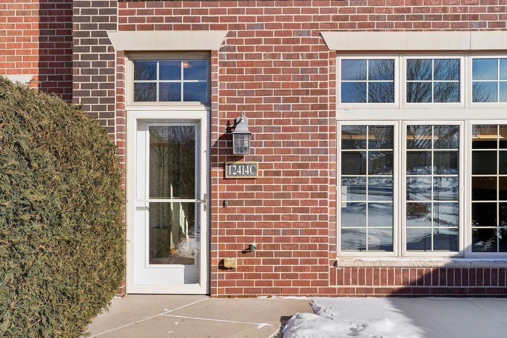 Photo of 12414 Flanders Court NE #C, Blaine, MN 55449 (MLS # 7000828)