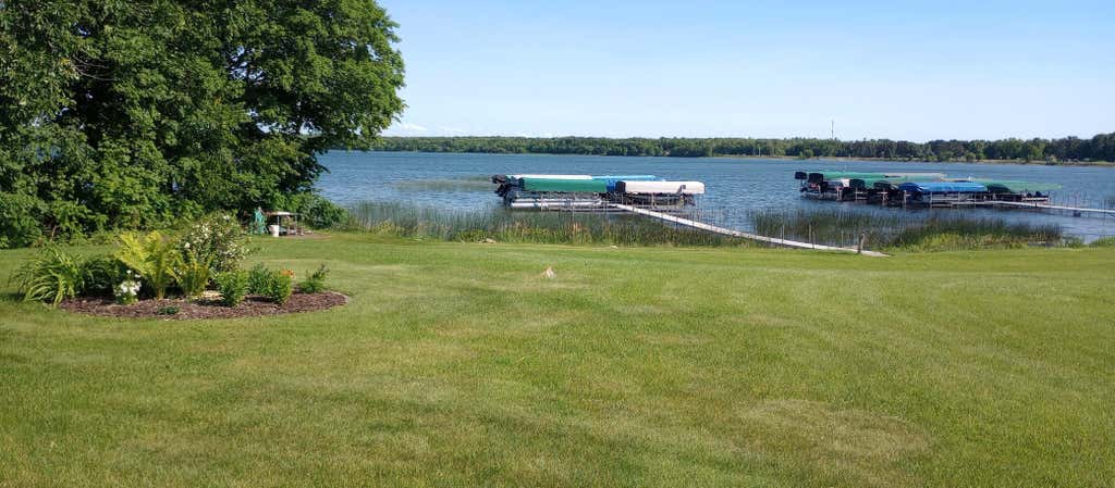 Photo of 18091 Earle Brown Drive #E1, Garrison, MN 56450 (MLS # 7101582)