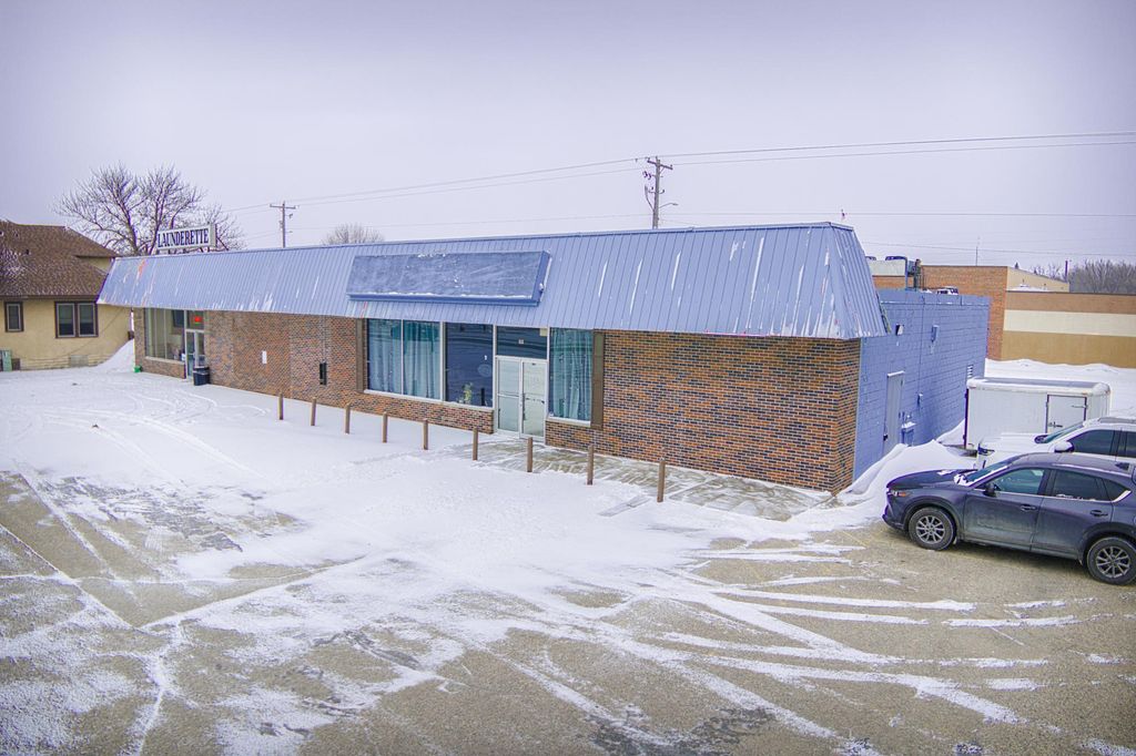 Photo of 916 Litchfield Avenue SW, Willmar, MN 56201 (MLS # 7006932)