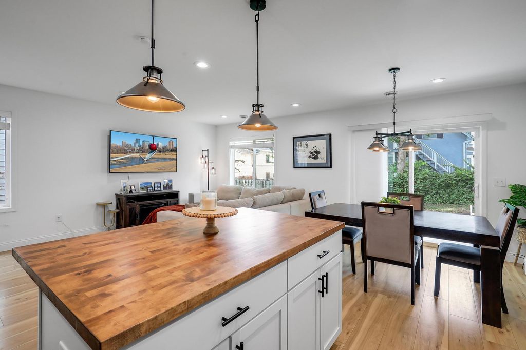 Photo of 703 Surrey Avenue, Saint Paul, MN 55106 (MLS # 7016297)