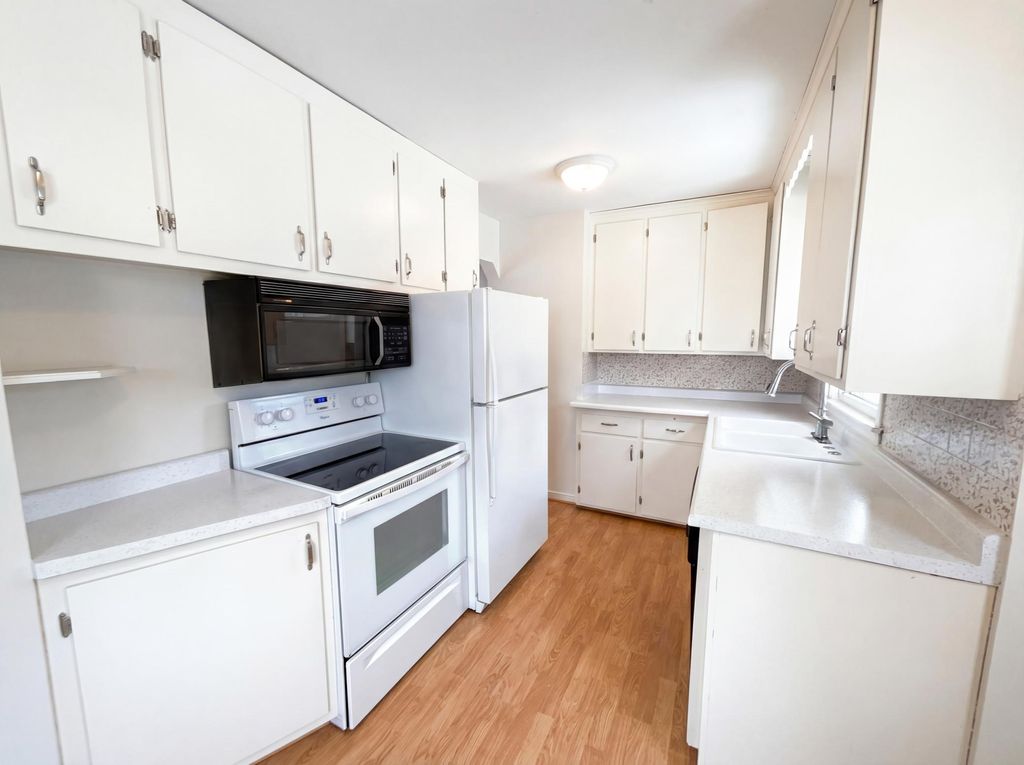 Photo of 8839 Tyler Street NE, Blaine, MN 55434 (MLS # 7020653)