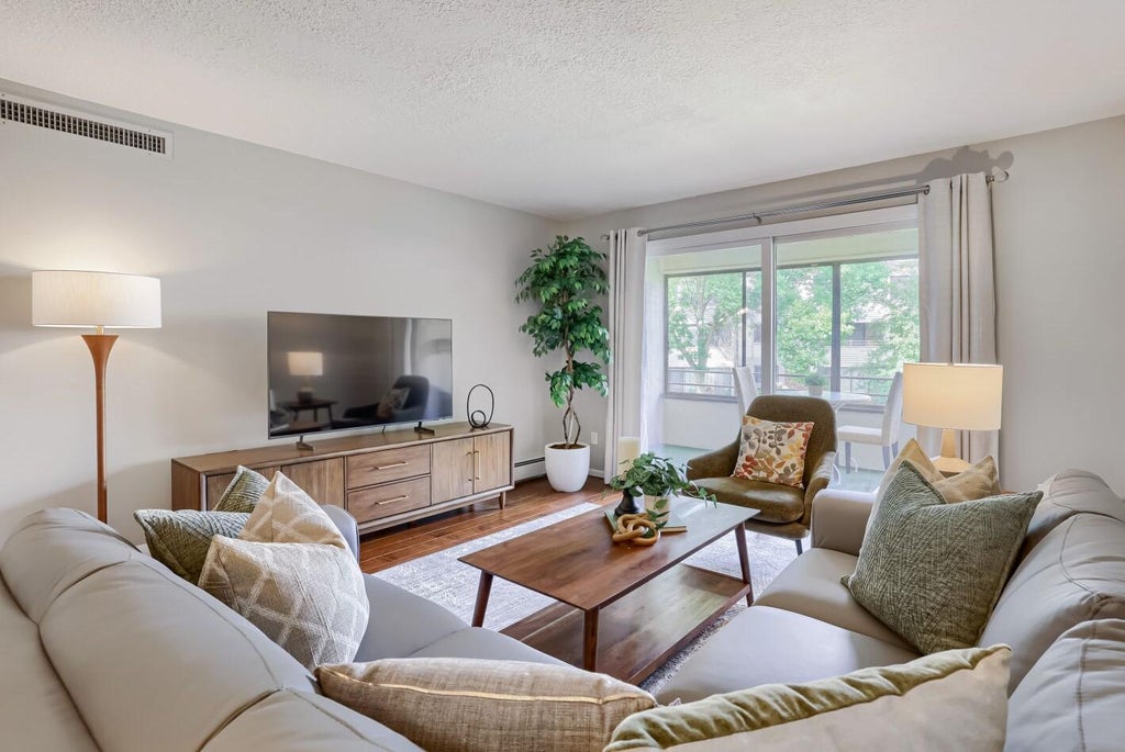 Photo of 10600 43rd Avenue N #202, Plymouth, MN 55442 (MLS # 7092863)