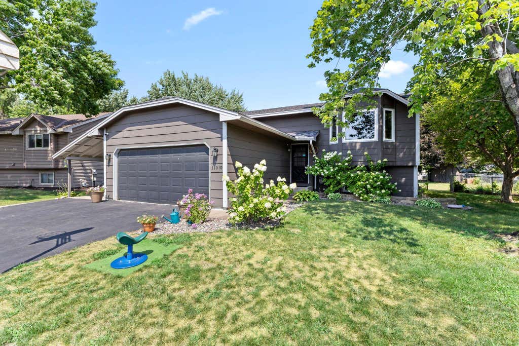 Photo of 11010 Xylon Lane N, Champlin, MN 55316 (MLS # 7121843)