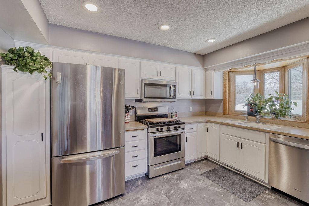 Photo of 8020 122nd Lane N, Champlin, MN 55316 (MLS # 7007494)