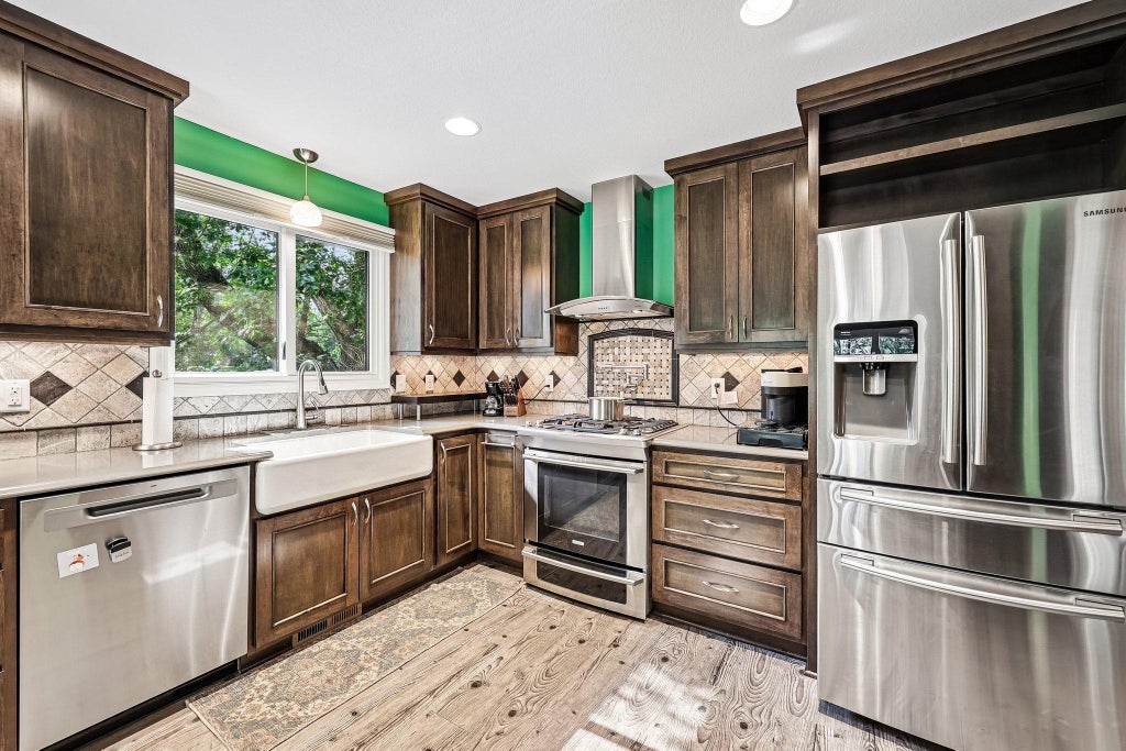 Photo of 12501 63rd Avenue N, Maple Grove, MN 55369 (MLS # 7140485)