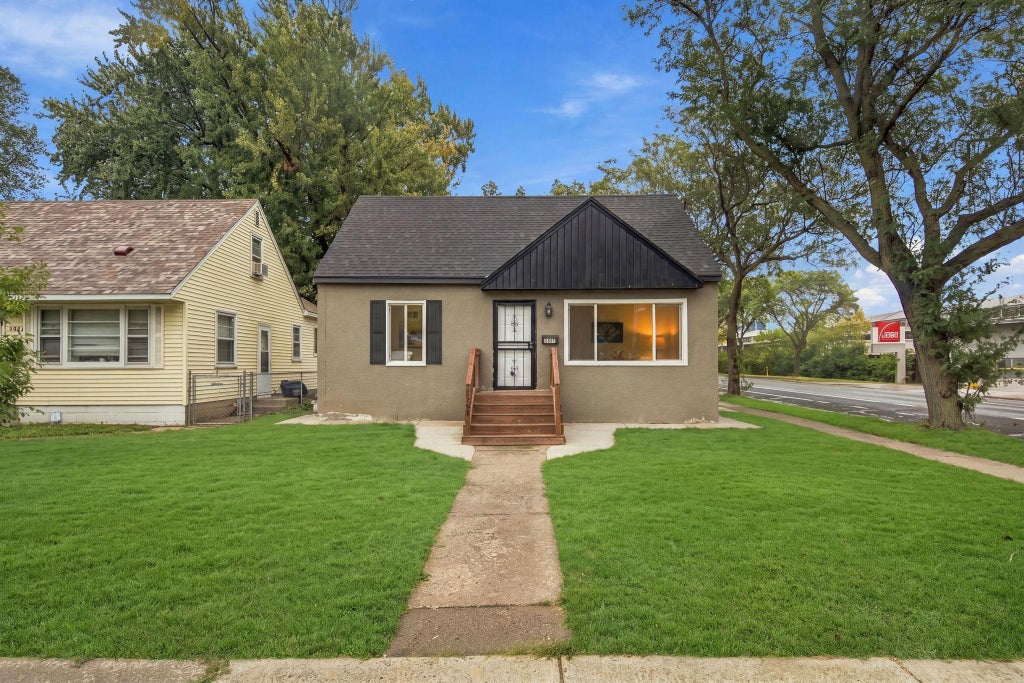 Photo of 4900 Morgan Avenue N, Minneapolis, MN 55430 (MLS # 7130467)