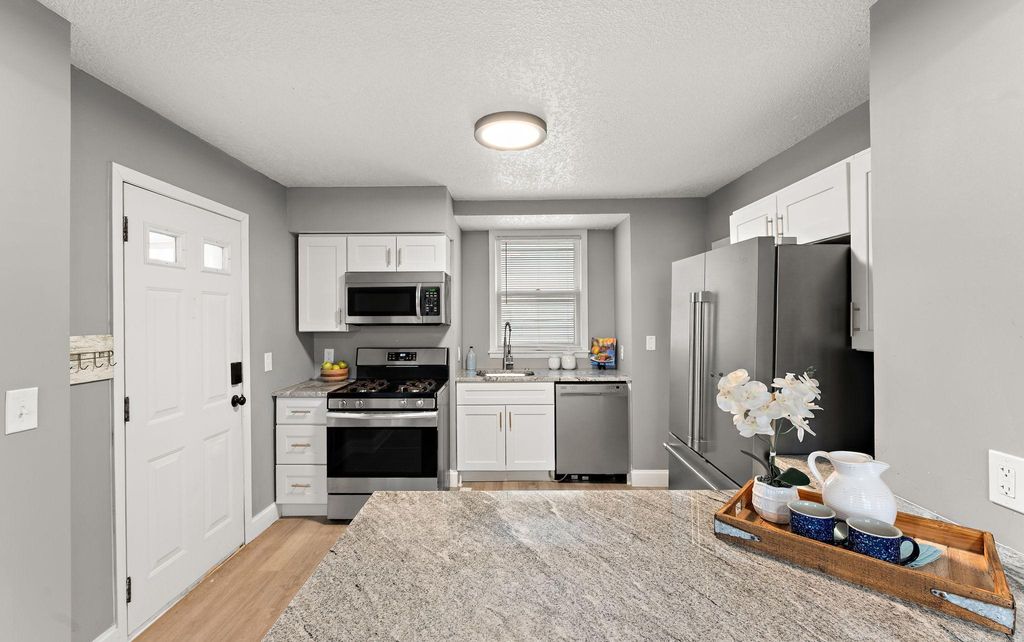 Photo of 303 Cesar Chavez Street, Saint Paul, MN 55107 (MLS # 7053290)