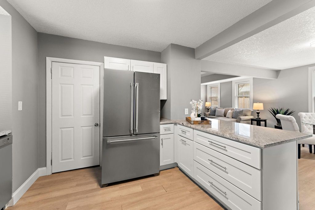 Photo of 303 Cesar Chavez Street, Saint Paul, MN 55107 (MLS # 7053290)