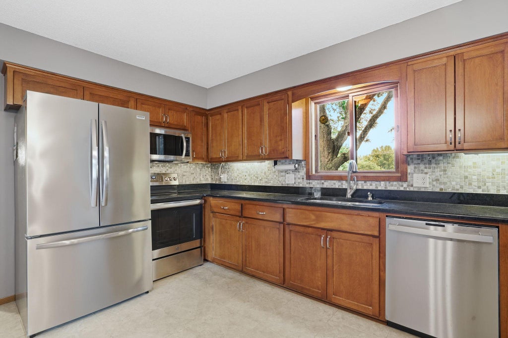Photo of 6207 Edgemont Boulevard N, Brooklyn Park, MN 55428 (MLS # 7162334)