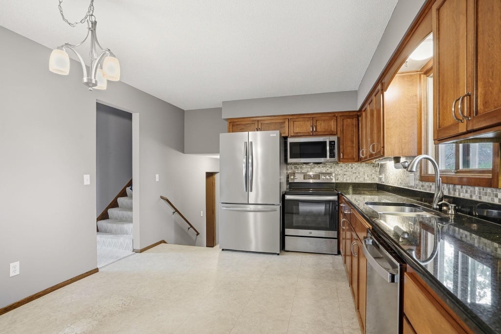 Photo of 6207 Edgemont Boulevard N, Brooklyn Park, MN 55428 (MLS # 7162334)