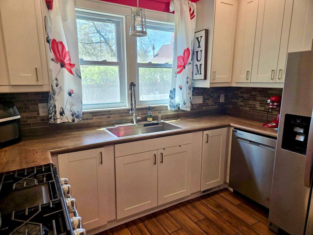 Photo of 419 Norfolk Avenue NW, Elk River, MN 55330 (MLS # 7070349)