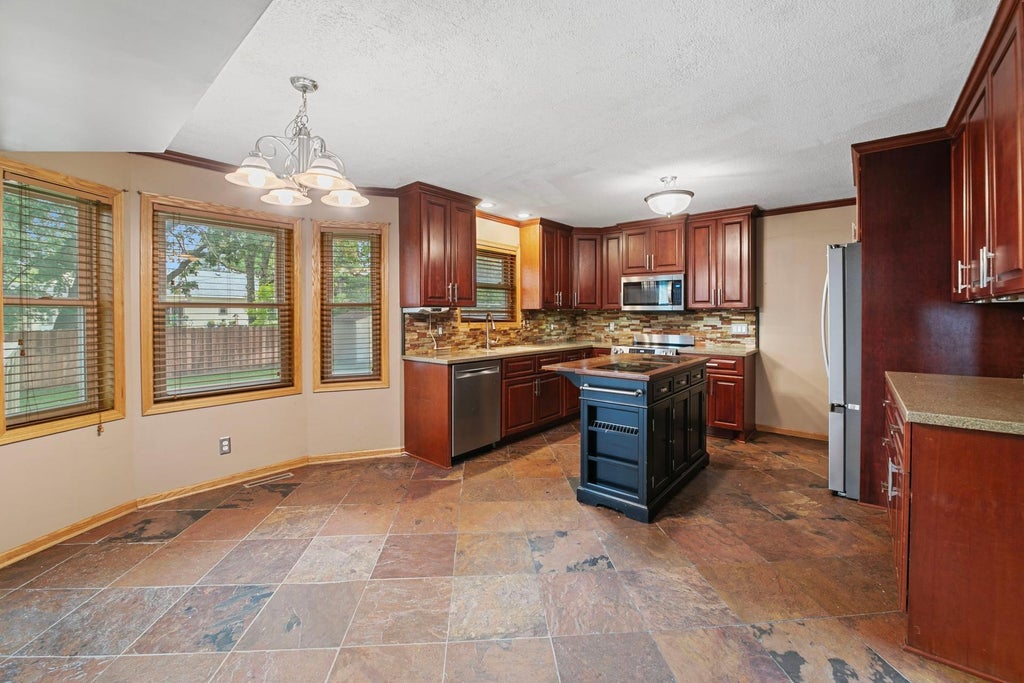 Photo of 1871 130th Lane NW, Coon Rapids, MN 55448 (MLS # 7149743)