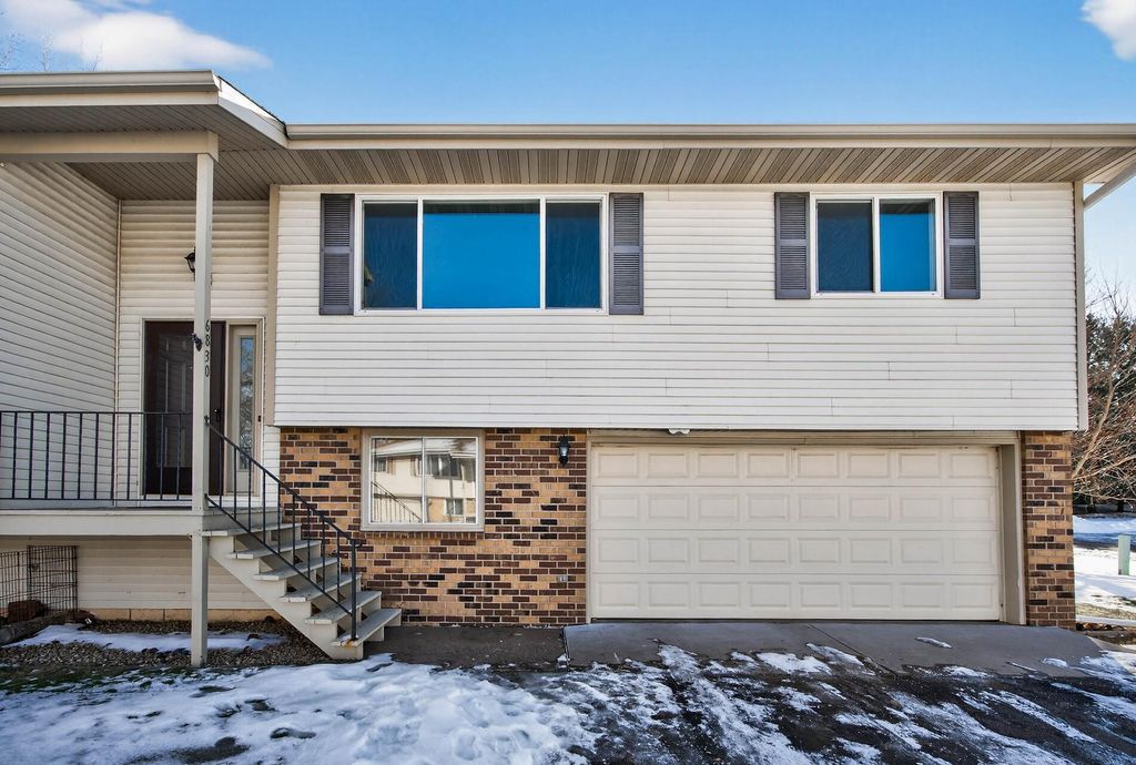 Photo of 6830 Sandlewood Road, Woodbury, MN 55125 (MLS # 7003849)