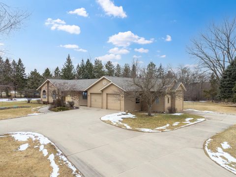 Photo of 1090 Buckridge Drive NE, Rochester, MN 55906 (MLS # 7017001)