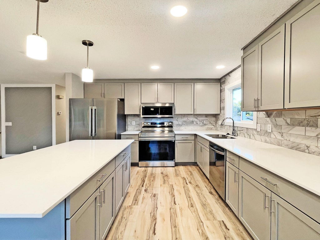 Photo of 15828 Harwell Avenue, Apple Valley, MN 55124 (MLS # 7163837)