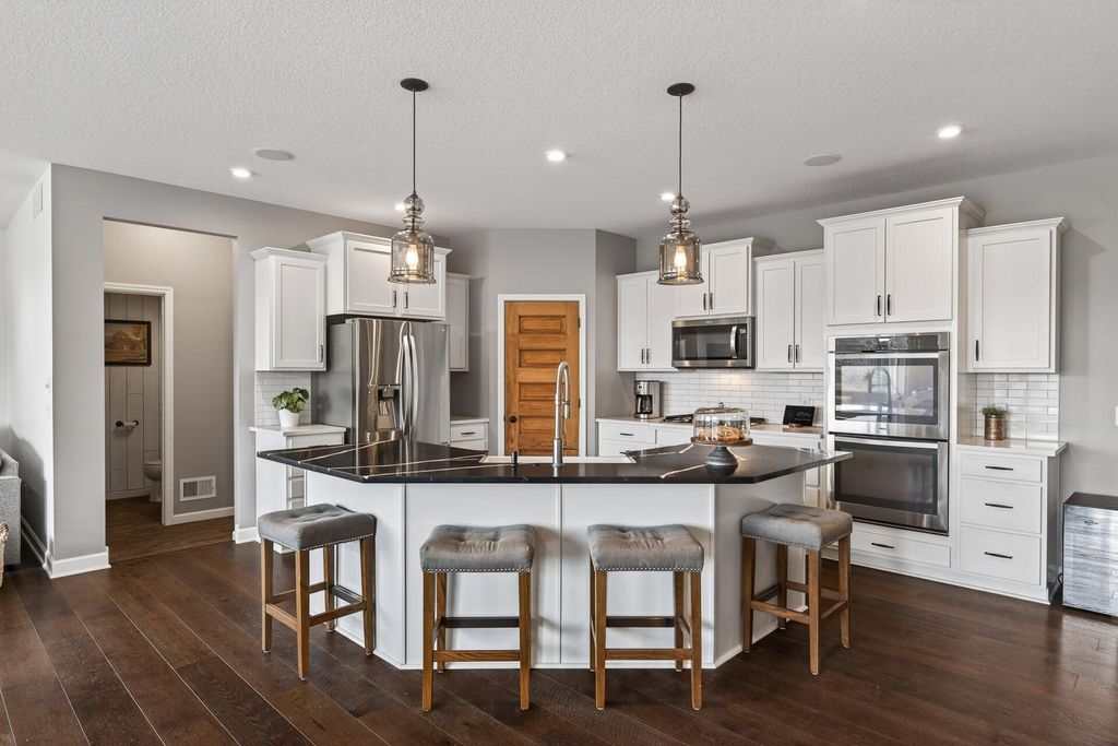 Photo of 6911 Alvarado Lane N, Maple Grove, MN 55311 (MLS # 7057868)