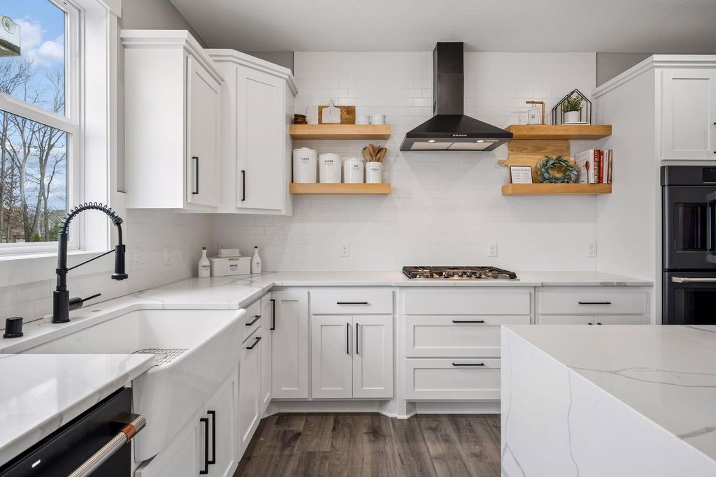 Photo of 12760 Guadalcanal Street NE, Blaine, MN 55449 (MLS # 7032161)