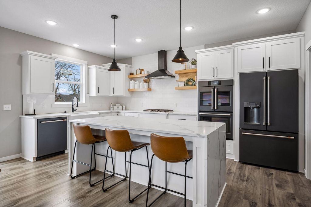 Photo of 12760 Guadalcanal Street NE, Blaine, MN 55449 (MLS # 7032161)