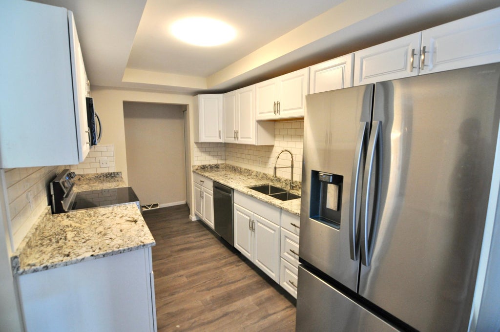 Photo of 5845 Lake Curve Lane, Brooklyn Center, MN 55429 (MLS # 7147535)
