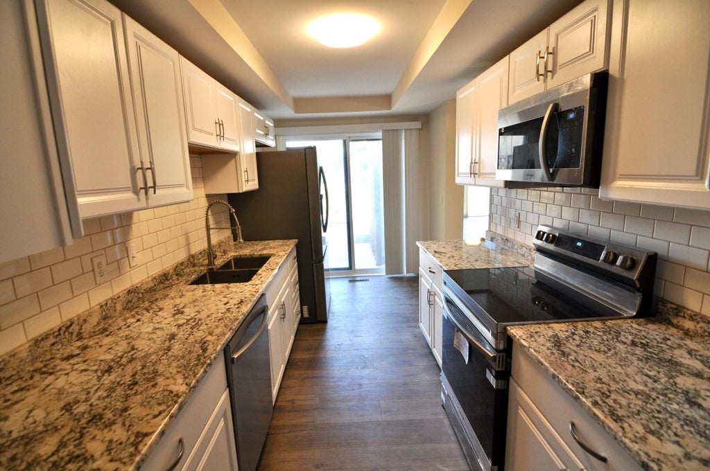 Photo of 5845 Lake Curve Lane, Brooklyn Center, MN 55429 (MLS # 7147535)